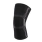 Black knit knee pad with gray support panels and no colored accent stripe.