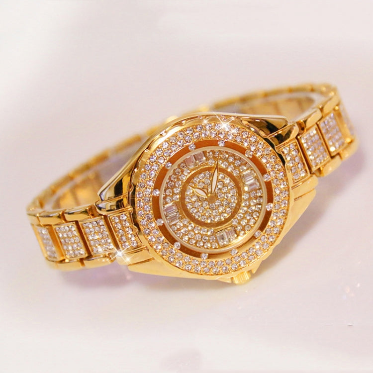 Gold-tone ladies watch with round diamond-style bezel and link bracelet