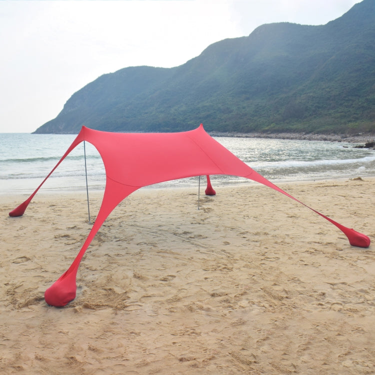 Outdoor beach sunshade canopy tent with red fabric stretched on corner poles
