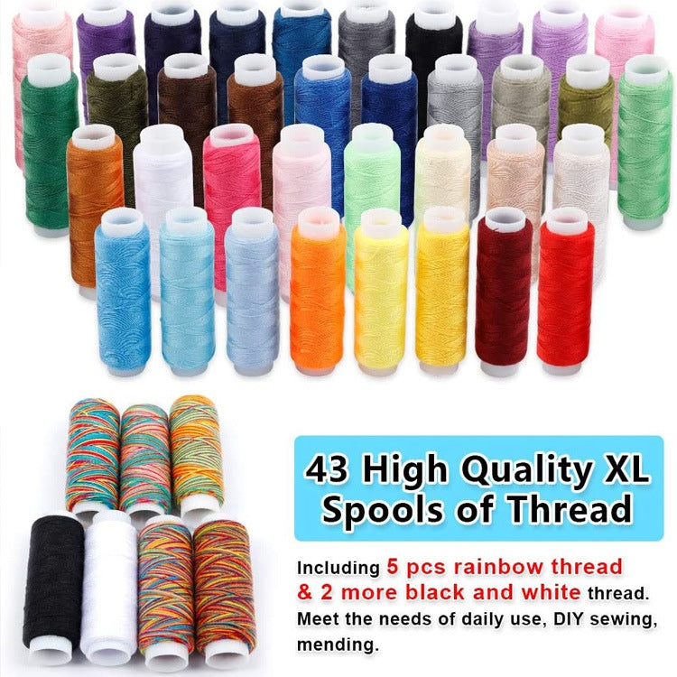 Assorted high-quality thread spools in many colors arranged for a sewing kit