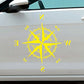 Yellow compass rose car body sticker with N E S W directions and compass ring