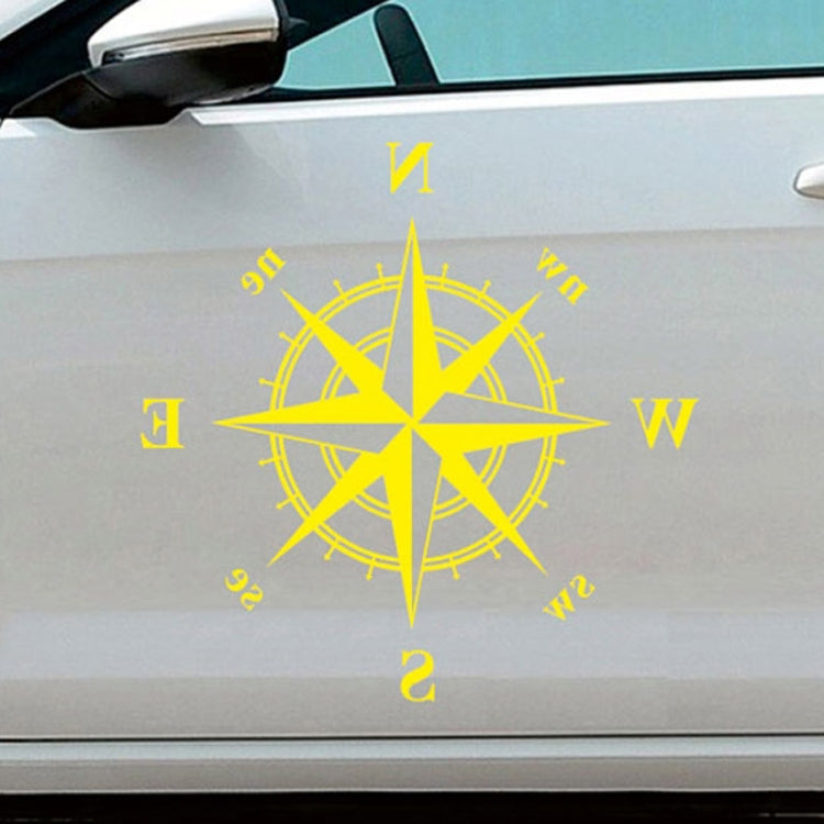 Yellow compass rose car body sticker with N E S W directions and compass ring