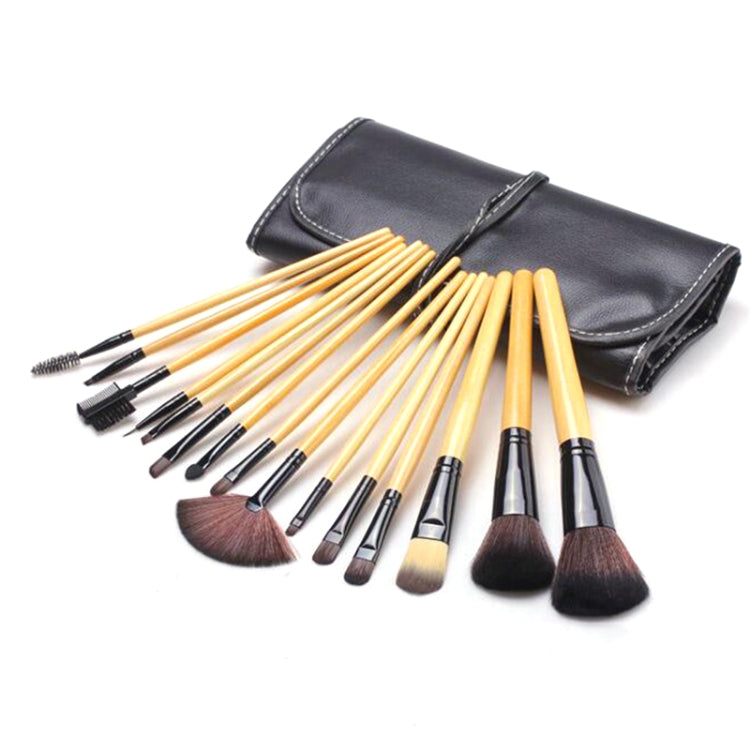 Makeup brush set with soft powder brushes, black-and-wood handles, and black storage case