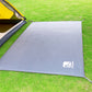 Grey waterproof picnic ground mat with corner grommets and fabric edge ties