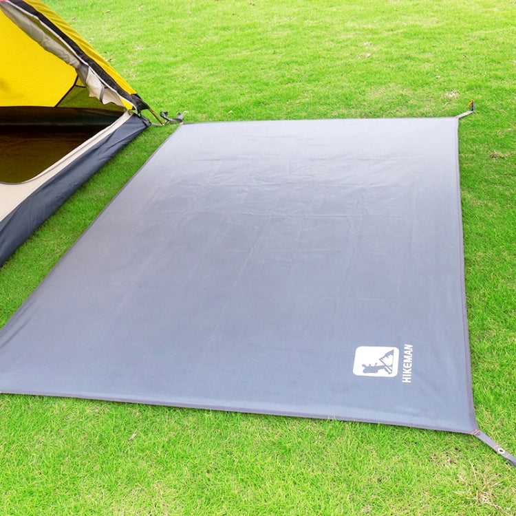 Grey waterproof picnic ground mat with corner grommets and fabric edge ties