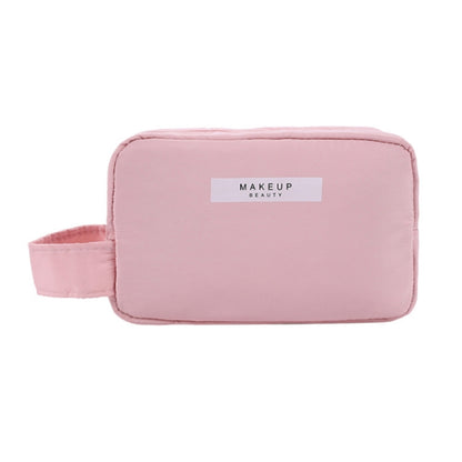 Pink zippered cosmetic storage bag with side handle, large rectangular pouch