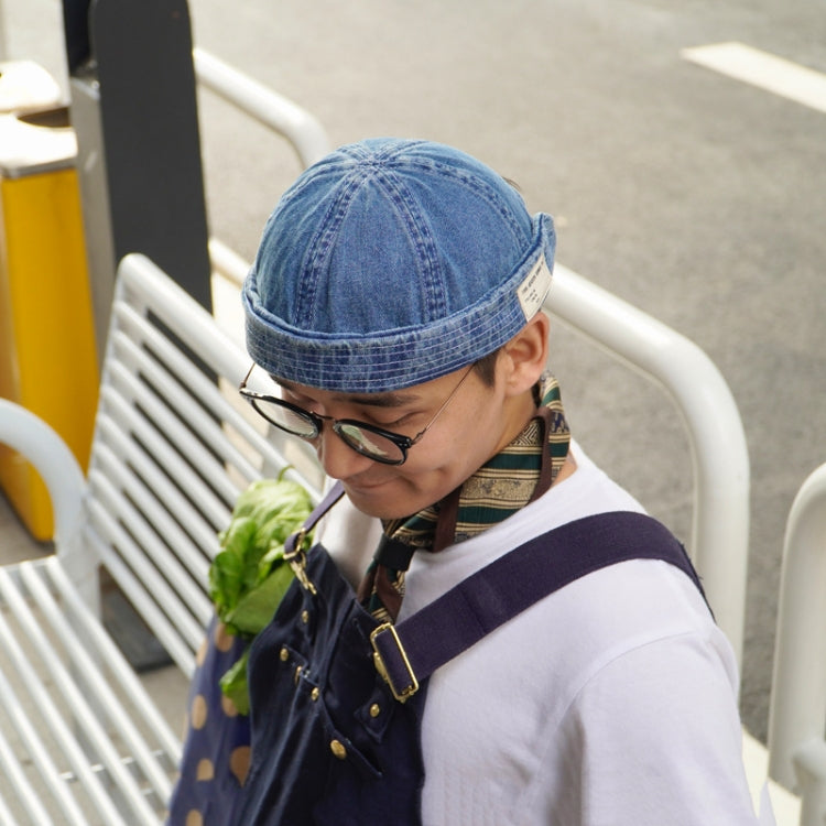 Denim blue denim melon cap with short brim and stitched crown panels