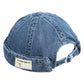 Denim blue denim cap with back opening, curved brim, and fabric label patch