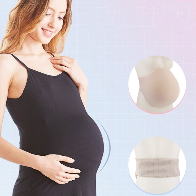 Beige fake pregnancy belly foam with wide waist belt worn under a black tank top