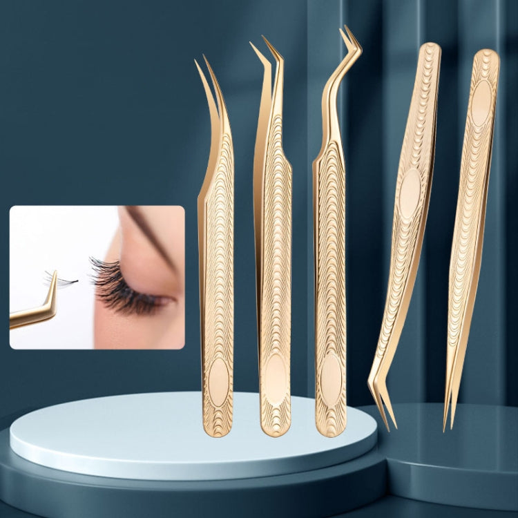 Set of gold eyelash extension tweezers with varied curved tips and patterned handles