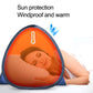 Blue pop-up sunshade tent on a bed with a person lying inside