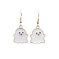 Pair of white ghost charm earrings with gold-tone hooks and smiling face detail.