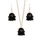 Pair of black ghost charm earrings with gold-tone hooks and smiling face detail.