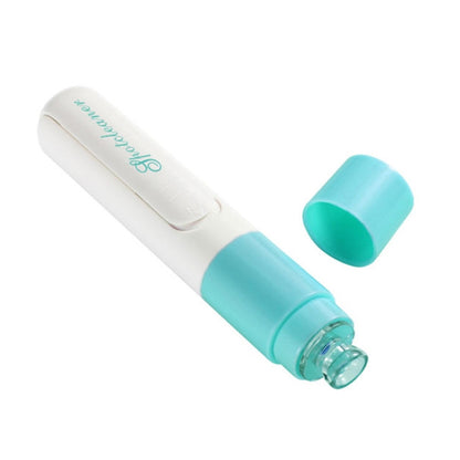Electric pore vacuum tool with teal and white handle, clear suction tip attachment
