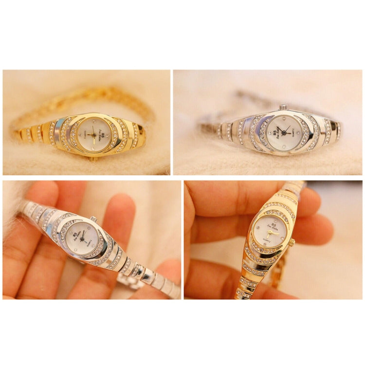 Oval ladies chain watches with rhinestone bezels in gold, rose gold, and silver views