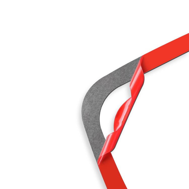 Adhesive trim sticker edge with red release backing and gray backing strip