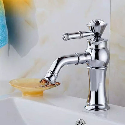 Chrome bathroom basin faucet with hot and cold valves and short spout