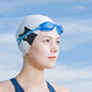 Light gray silicone swimming cap with black swan cartoon print