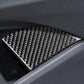 Carbon fiber-look door storage panel insert with textured weave inside recess