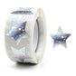 White roll of star sealing stickers with blue and silver glitter stars, 25mm size