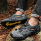 Gray hiking sandals with laced strap, rugged sole with yellow tread