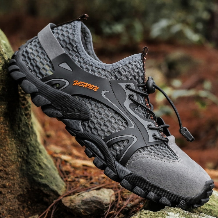 Grey mesh outdoor water shoe with eyelet lacing, black accents, and thick tread sole