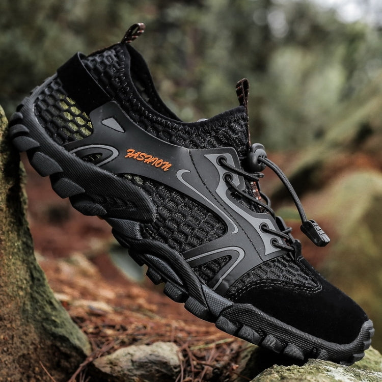 Black outdoor wading sandal shoe with lace-up front and rugged traction tread sole.