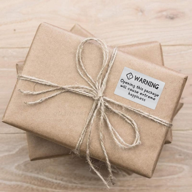 Wrapped kraft gift with warning sealing sticker, 40x60mm, tied with twine