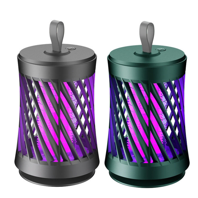Pair of mosquito killer night lights: dark gray and dark green with purple UV glow