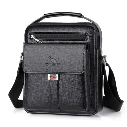 Men's black leather-look messenger bag with front flap, zip pocket, and adjustable shoulder strap