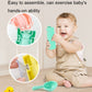 Bath slide building block toy held by smiling child with teal launcher piece