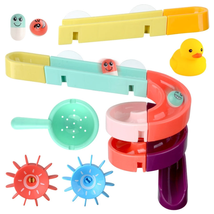 Colorful bath slide building blocks with suction bases and whale, fish, and sun parts