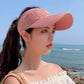 Pink ribbed peaked sun cap with curved brim and breathable knit eyelet detail.