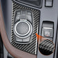 Installed carbon-fiber knob panel sticker around multimedia control in BMW interior
