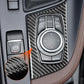 Carbon-fiber LHD multimedia knob panel sticker with cutout around control dial.