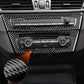 Installed carbon fiber trim sticker set around dashboard controls and radio panel