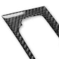 Carbon-fiber weave trim overlay with cutout opening, close-up corner view