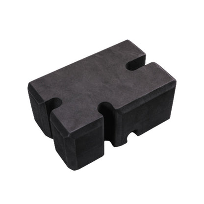 Dark foam bench press brick with molded cutouts for grip and alignment