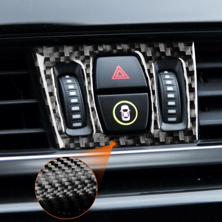 Central air outlet control panel with carbon-fiber trim sticker around buttons