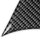 Steering wheel chin sticker close-up, black carbon-fiber weave pattern on curved trim