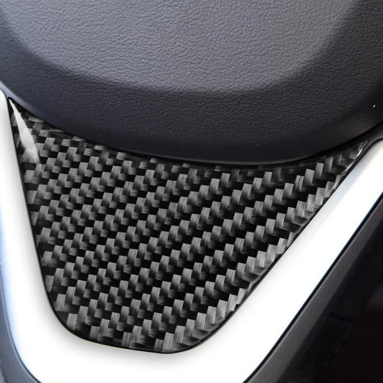 Installed steering wheel chin trim, black carbon-fiber woven insert under steering wheel