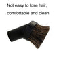 Horsehair vacuum brush head with dense brown bristles on black nozzle