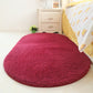 Magenta oval plush pet bed pad with dense shag fabric