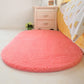 Pink plush pet bed pad, shag fabric, rounded oval cushion