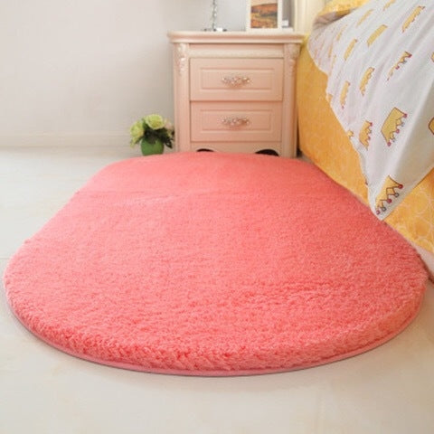 Pink plush pet bed pad, shag fabric, rounded oval cushion