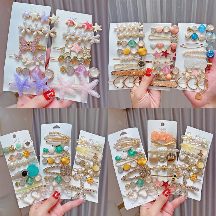 Colorful charm hairpin set with stars, bows, pearls, and heart shapes on cards