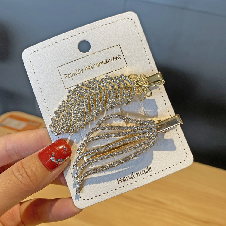 Gold-tone rhinestone leaf and pearl hair clip set with layered barrette clips