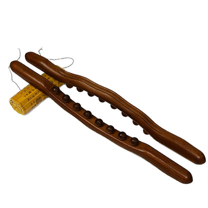 Carbonized beech wood massage stick with eight round beads, 53cm