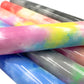 Rainbow watercolor tie-dye heat transfer vinyl stack, bright pink, yellow, green, and blue