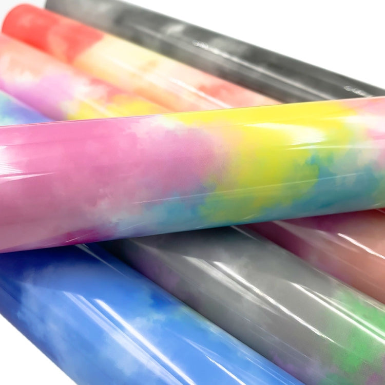 Rainbow watercolor tie-dye heat transfer vinyl stack, bright pink, yellow, green, and blue